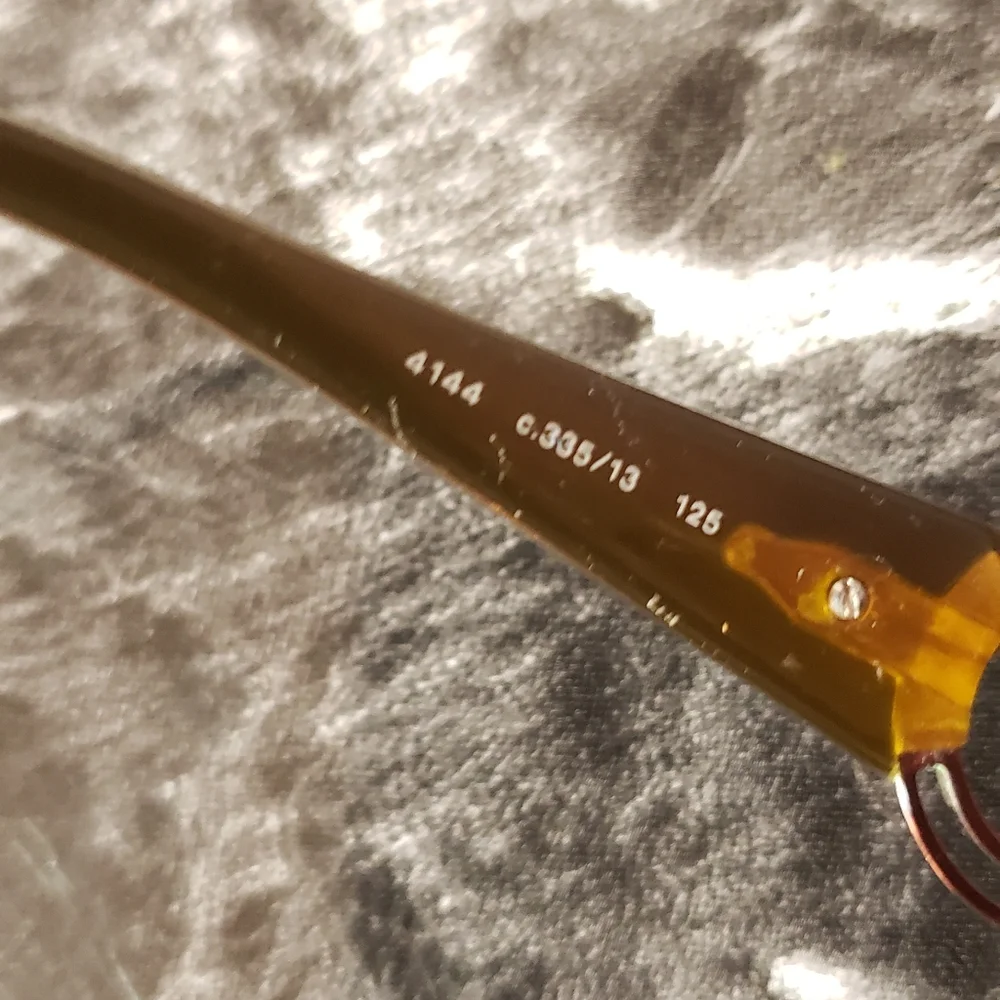CHANEL Black Frames with Brown Gradient Lenses and Gold CC Accent Sunglasses.